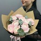 Букет из 9 нежно-розовых ранункулюсов и эвкалипта в крафте