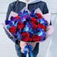 Розы и орхидеи в букете
